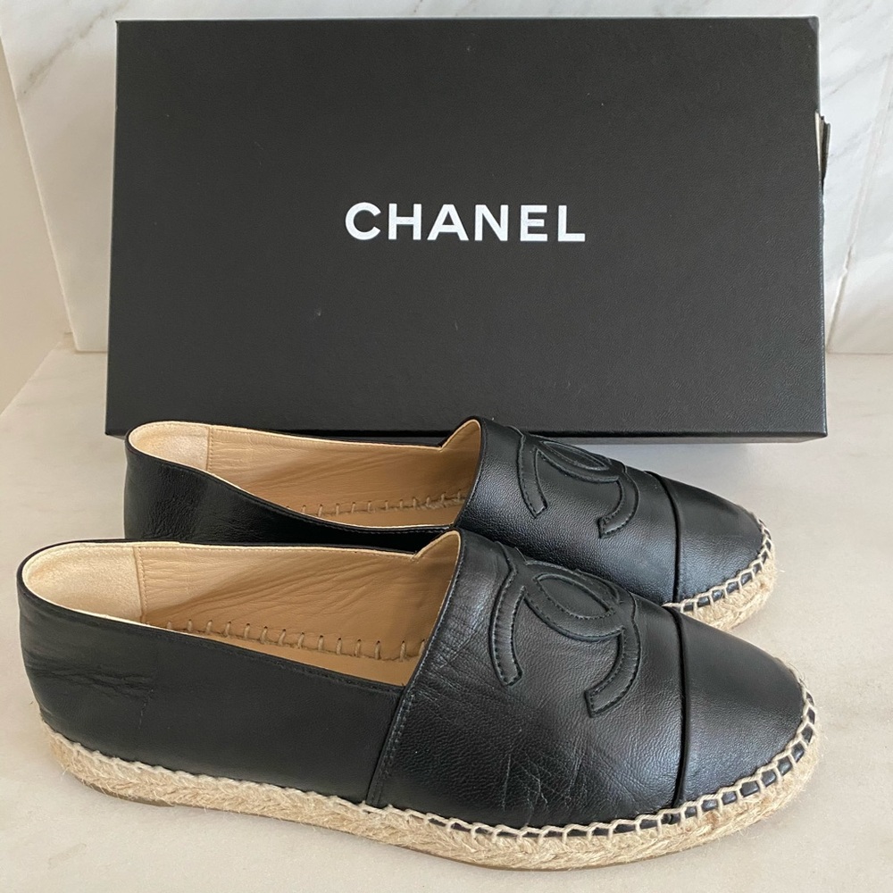 CHANEL black lambskin CC espadrilles.